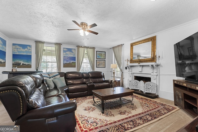 2540 Sugar Hill Rd, Unadilla, GA 31091 - living room featuring a ceiling fan, a fireplace, and a textured ceiling