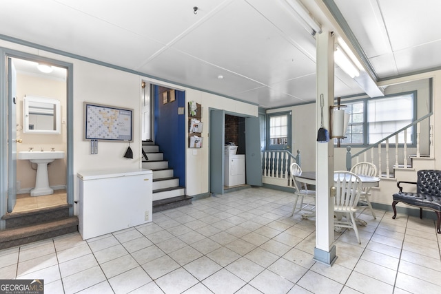 2540 Sugar Hill Rd, Unadilla, GA 31091 - community lobby with stairway and washer / dryer