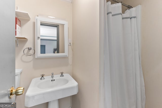 2540 Sugar Hill Rd, Unadilla, GA 31091 - bathroom with a sink and a shower with curtain