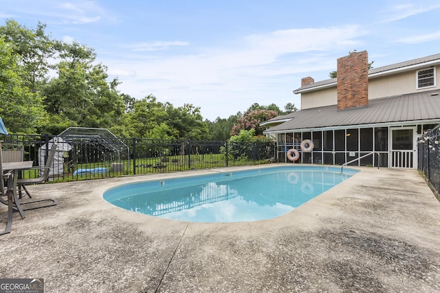 2540 Sugar Hill Rd, Unadilla, GA 31091 - view of swimming pool with a sunroom and a patio area