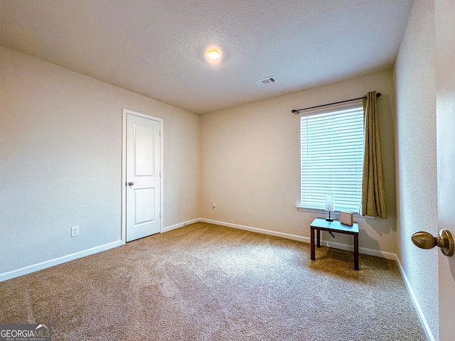 534 Meadows Farm Dr, Monroe, GA 30655 - carpeted spare room with baseboards and a textured ceiling