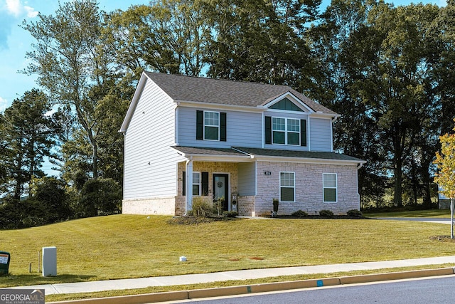 534 Meadows Farm Dr, Monroe, GA 30655 - view of front facade with a front yard, stone siding, and roof with shingles