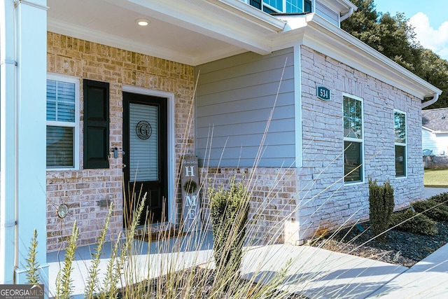 534 Meadows Farm Dr, Monroe, GA 30655 - view of exterior entry featuring stone siding