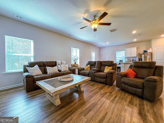 534 Meadows Farm Dr, Monroe, GA 30655 - living area with dark wood-style floors, a textured ceiling, ceiling fan, and recessed lighting