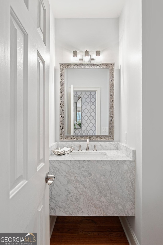 196 Mystic Ct, Atlanta, GA 30342 - bathroom with vanity and wood finished floors