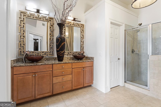 196 Mystic Ct, Atlanta, GA 30342 - full bath featuring tile patterned floors, a stall shower, and double vanity