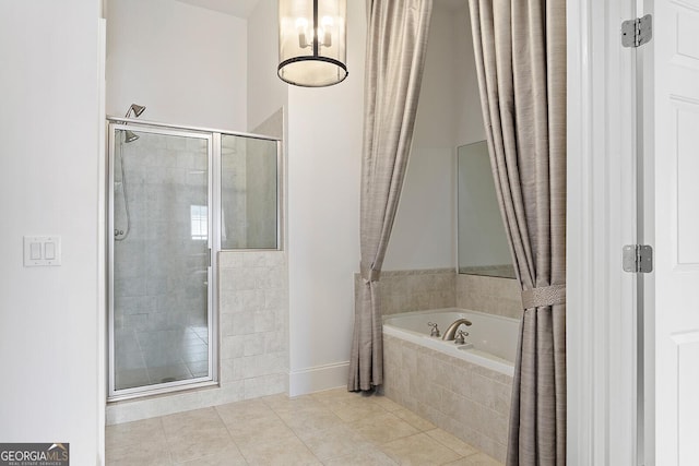 196 Mystic Ct, Atlanta, GA 30342 - full bathroom featuring tile patterned floors, a stall shower, and a bath