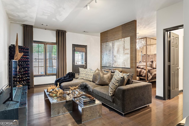 196 Mystic Ct, Atlanta, GA 30342 - living room featuring wood finished floors and track lighting