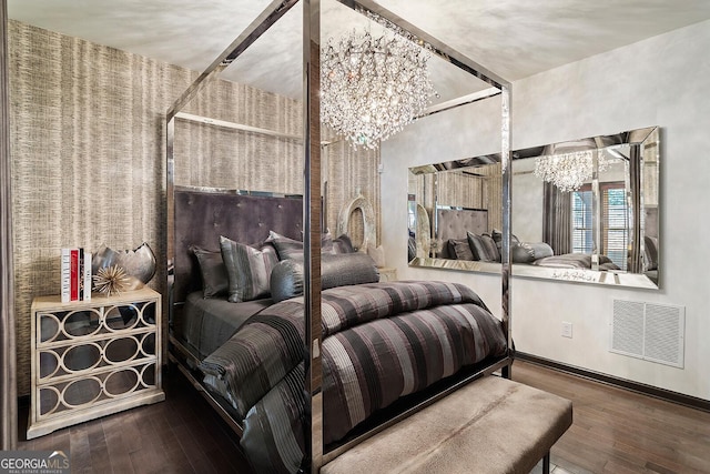 196 Mystic Ct, Atlanta, GA 30342 - bedroom featuring a chandelier and hardwood / wood-style floors