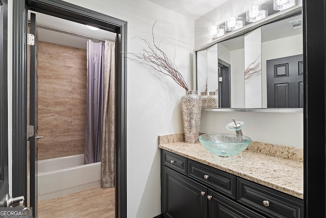 196 Mystic Ct, Atlanta, GA 30342 - bathroom featuring vanity and shower / tub combo