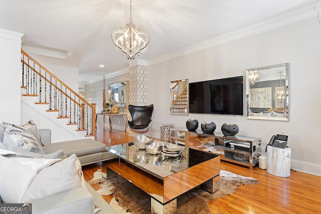196 Mystic Ct, Atlanta, GA 30342 - living room with stairs, a chandelier, wood finished floors, and ornamental molding