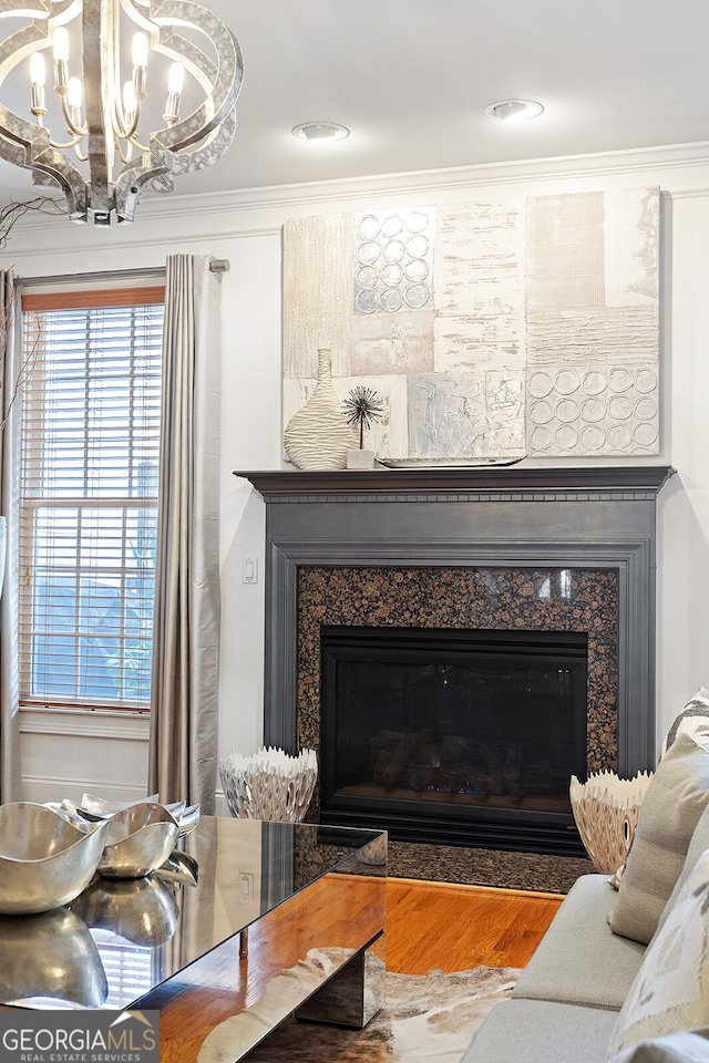 196 Mystic Ct, Atlanta, GA 30342 - detailed view of a chandelier, a high end fireplace, and crown molding