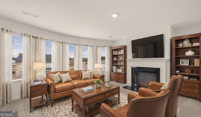 683 Edgar, Hampton, GA 30228 - living room with a fireplace with flush hearth and baseboards
