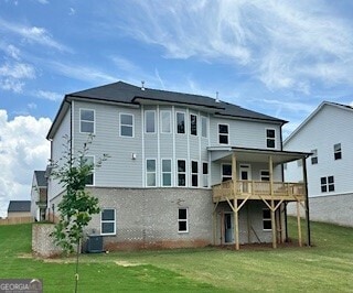 683 Edgar, Hampton, GA 30228 - rear view of property featuring a yard and a deck