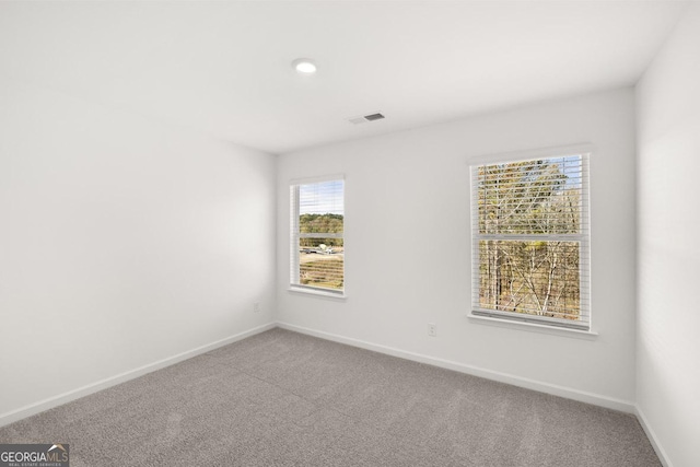 683 Edgar, Hampton, GA 30228 - carpeted spare room with baseboards and recessed lighting