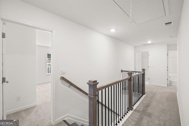 683 Edgar, Hampton, GA 30228 - corridor with an upstairs landing, attic access, carpet, and recessed lighting