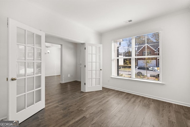 683 Edgar, Hampton, GA 30228 - empty room with wood finished floors and french doors