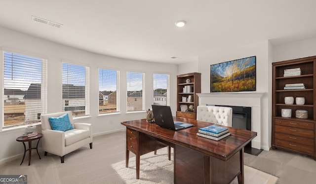 683 Edgar, Hampton, GA 30228 - office space featuring a glass covered fireplace and light carpet