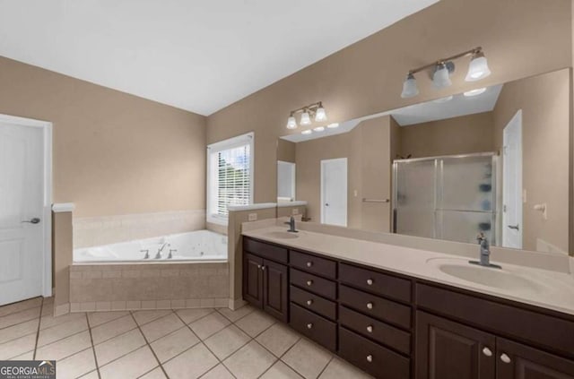 3737 Falls Trl, Winston, GA 30187 - full bathroom featuring double vanity, a stall shower, tile patterned floors, and a garden tub