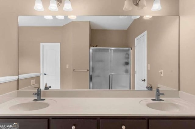 3737 Falls Trl, Winston, GA 30187 - bathroom featuring double vanity and a shower stall