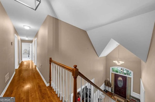 3737 Falls Trl, Winston, GA 30187 - foyer featuring wood finished floors and a chandelier