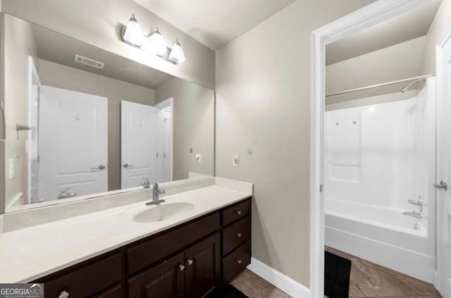 3737 Falls Trl, Winston, GA 30187 - bathroom with vanity, shower / bathtub combination, and tile patterned flooring