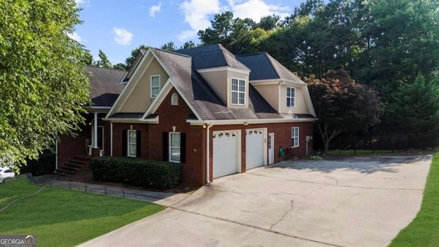 3737 Falls Trl, Winston, GA 30187 - view of front facade with driveway, brick siding, and a front yard