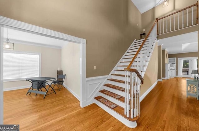 3737 Falls Trl, Winston, GA 30187 - stairway featuring wood finished floors and a high ceiling