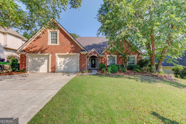 805 River Vly, Dacula, GA 30019 - traditional home with a garage, a front lawn, brick siding, and driveway