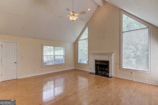 805 River Vly, Dacula, GA 30019 - unfurnished living room with light wood-style flooring, ceiling fan, and a premium fireplace