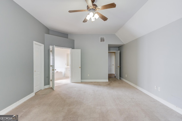 805 River Vly, Dacula, GA 30019 - unfurnished bedroom featuring lofted ceiling, light colored carpet, ensuite bathroom, and ceiling fan