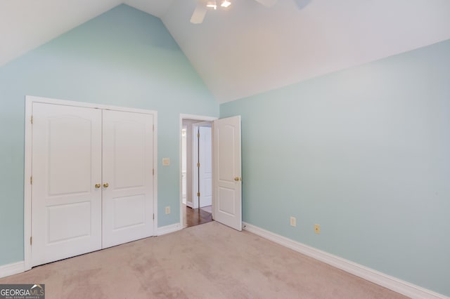805 River Vly, Dacula, GA 30019 - unfurnished bedroom with high vaulted ceiling, carpet floors, a closet, and ceiling fan