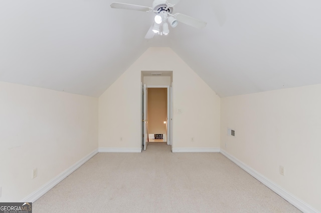 805 River Vly, Dacula, GA 30019 - additional living space with light carpet, vaulted ceiling, and a ceiling fan