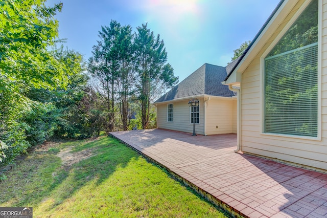 805 River Vly, Dacula, GA 30019 - view of grassy yard featuring a patio