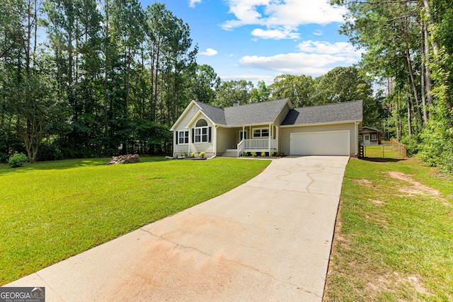 80 Austin Woods Dr, Senoia, GA 30276 - ranch-style home with driveway, a porch, a garage, and a front lawn