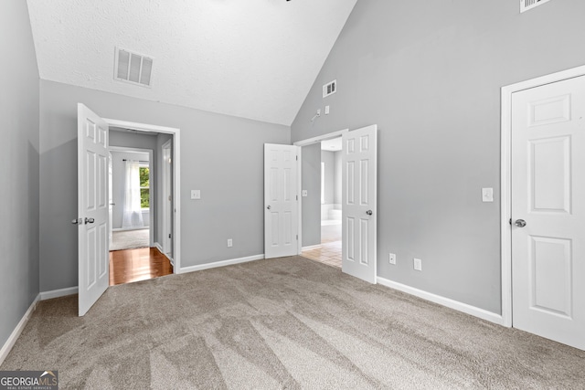 80 Austin Woods Dr, Senoia, GA 30276 - unfurnished bedroom featuring carpet floors and high vaulted ceiling