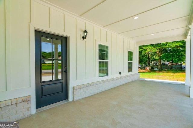 540 Sunset Ave, Comer, GA 30629 - property entrance with board and batten siding and a porch