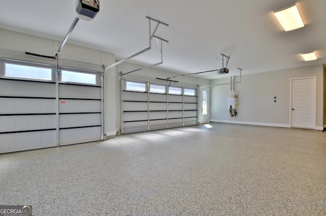 194 Forest Berry Ct Unit 98M2, Newnan, GA 30265 - garage featuring water heater and a garage door opener