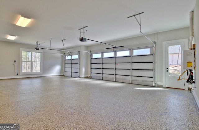 194 Forest Berry Ct Unit 98M2, Newnan, GA 30265 - garage with a garage door opener and water heater