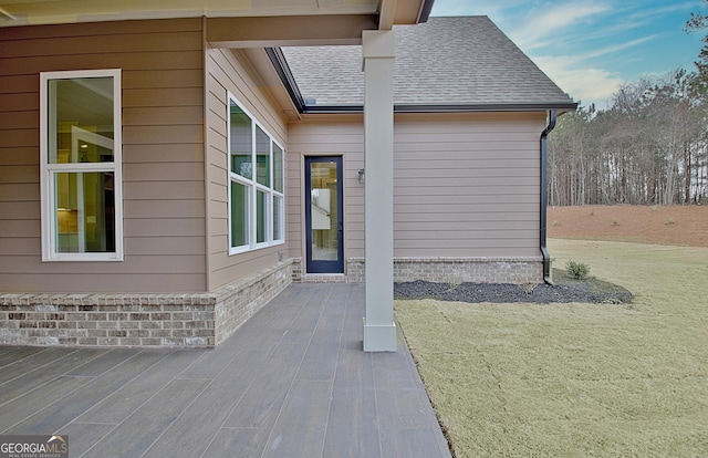 194 Forest Berry Ct Unit 98M2, Newnan, GA 30265 - view of exterior entry featuring a shingled roof