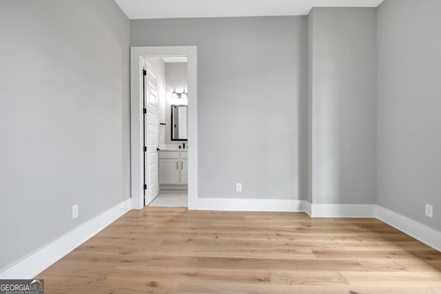 194 Forest Berry Ct Unit 98M2, Newnan, GA 30265 - empty room with light wood finished floors and baseboards