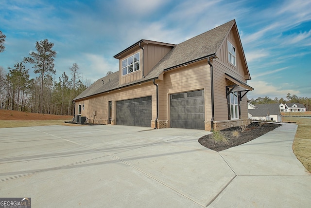 194 Forest Berry Ct Unit 98M2, Newnan, GA 30265 - view of property exterior with concrete driveway and an attached garage