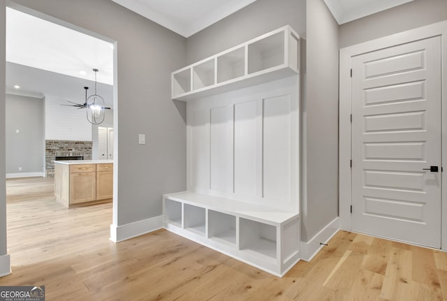 194 Forest Berry Ct Unit 98M2, Newnan, GA 30265 - mudroom with light wood-style flooring, a chandelier, ornamental molding, and recessed lighting