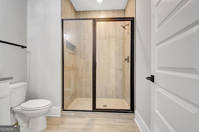 194 Forest Berry Ct Unit 98M2, Newnan, GA 30265 - bathroom featuring toilet and a stall shower