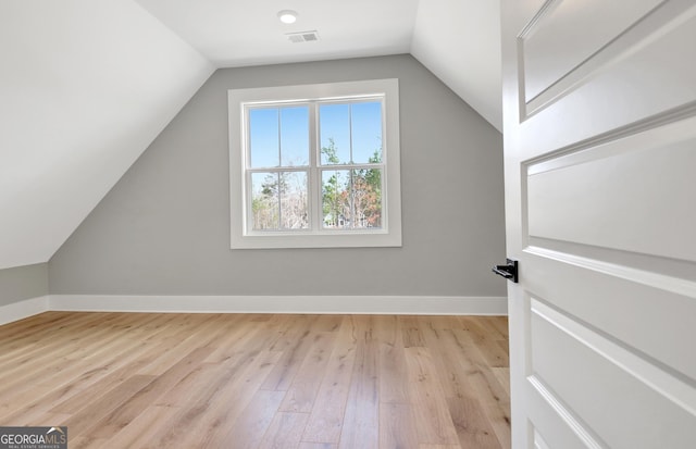194 Forest Berry Ct Unit 98M2, Newnan, GA 30265 - additional living space with lofted ceiling and wood finished floors
