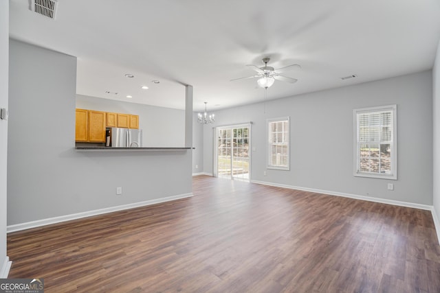 2203 Hyssop Way, Buford, GA 30519 - unfurnished living room with a chandelier, ceiling fan, recessed lighting, and dark wood-style floors