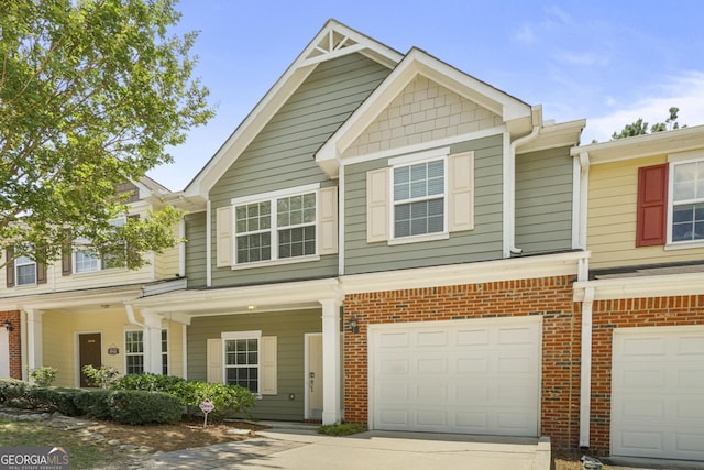 2203 Hyssop Way, Buford, GA 30519 - view of property with an attached garage, driveway, and brick siding