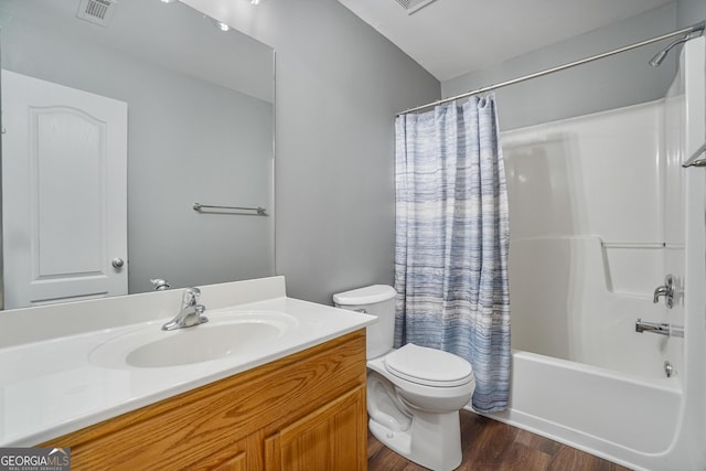 2203 Hyssop Way, Buford, GA 30519 - bathroom featuring vanity, wood finished floors, and shower / bath combo with shower curtain