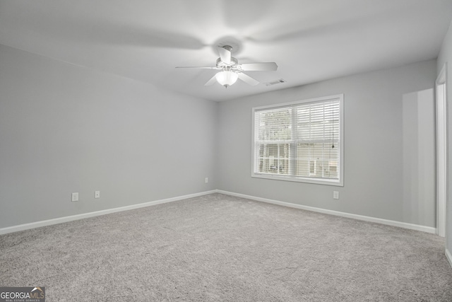 2203 Hyssop Way, Buford, GA 30519 - spare room featuring ceiling fan and carpet floors