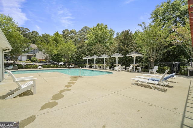 2203 Hyssop Way, Buford, GA 30519 - community pool featuring a patio area, view of scattered trees, and a gazebo